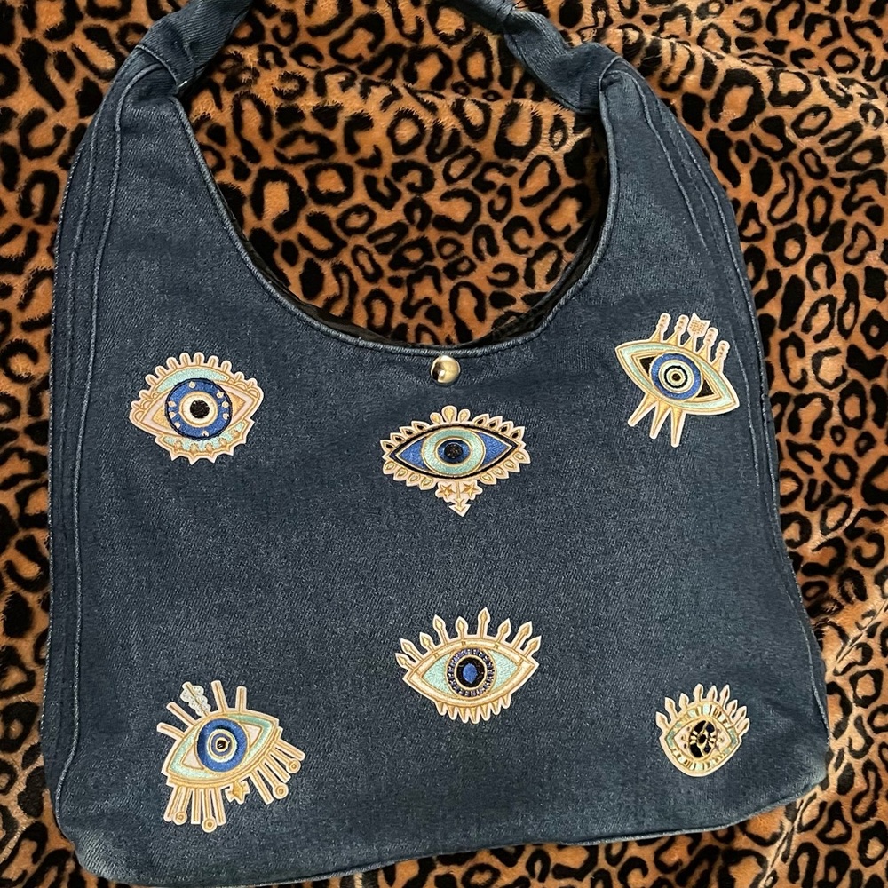 Black Shoulder Bag with Embroidered Eye Design